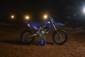 YZ450F Team Yamaha Blue on stand under stadium lights