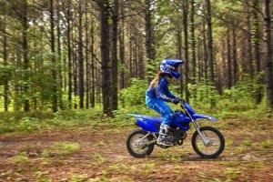 Riding TT-R110E on dirt road - right